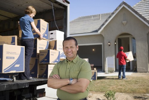 Careful loading of office equipment for a Camden business move