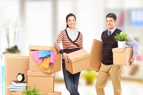 Local movers navigating a Camden flat with stairs and furniture