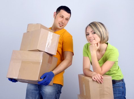 Packed boxes and household items prepared for removal truck hire
